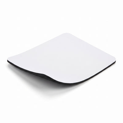 White neoprene mouse pad at an angle, showing its thickness and rounded corners