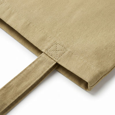 Calico khaki tote bag, close-up of the self-fabric handle and reinforced stitching