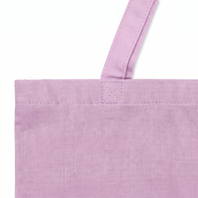 Calico lilac tote bag, close-up of the self-fabric handle and reinforced stitching
