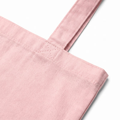 Calico pink tote bag, close-up of the self-fabric handle and reinforced stitching